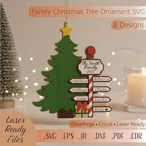 May include: A wooden Christmas tree ornament with a green tree, yellow star, and a signpost with family names. The sign reads "The Smith Family 2025". The ornament includes a gift box with a red bow. Text on the image says "Family Christmas Tree Ornament SVG".