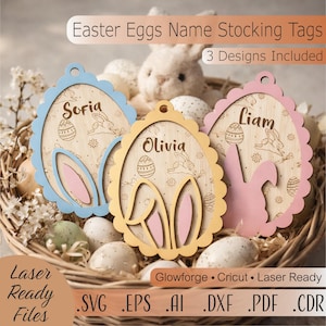 May include: Wooden Easter egg name stocking tags in blue, yellow, and pink with scalloped edges. Each tag features a name, bunny, and egg design. The image includes the text "Easter Eggs Name Stocking Tags" and "3 Designs Included."