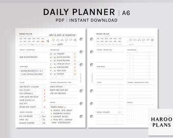 May include: A black and white daily planner with a white background and black text. The planner is divided into two sections, each with a daily plan heading. The left side of the planner has a section for focus and priorities, a section for schedules, a section for reminders, a section for to do, a section for things I am grateful for, a section for notes, and a section for money tracker. The right side of the planner has a section for focus and priorities, a section for schedules, a section for reminders, a section for to do, a section for things I am grateful for, a section for notes, and a section for money tracker. The planner also has a section for today's meals. The planner is designed to help people stay organized and on track with their daily tasks.