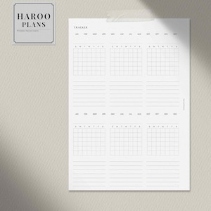 May include: A black and white printable planner insert with the text "HAROO PLANS" and "TRACKER". The planner insert has a monthly calendar layout with spaces for each day of the week.