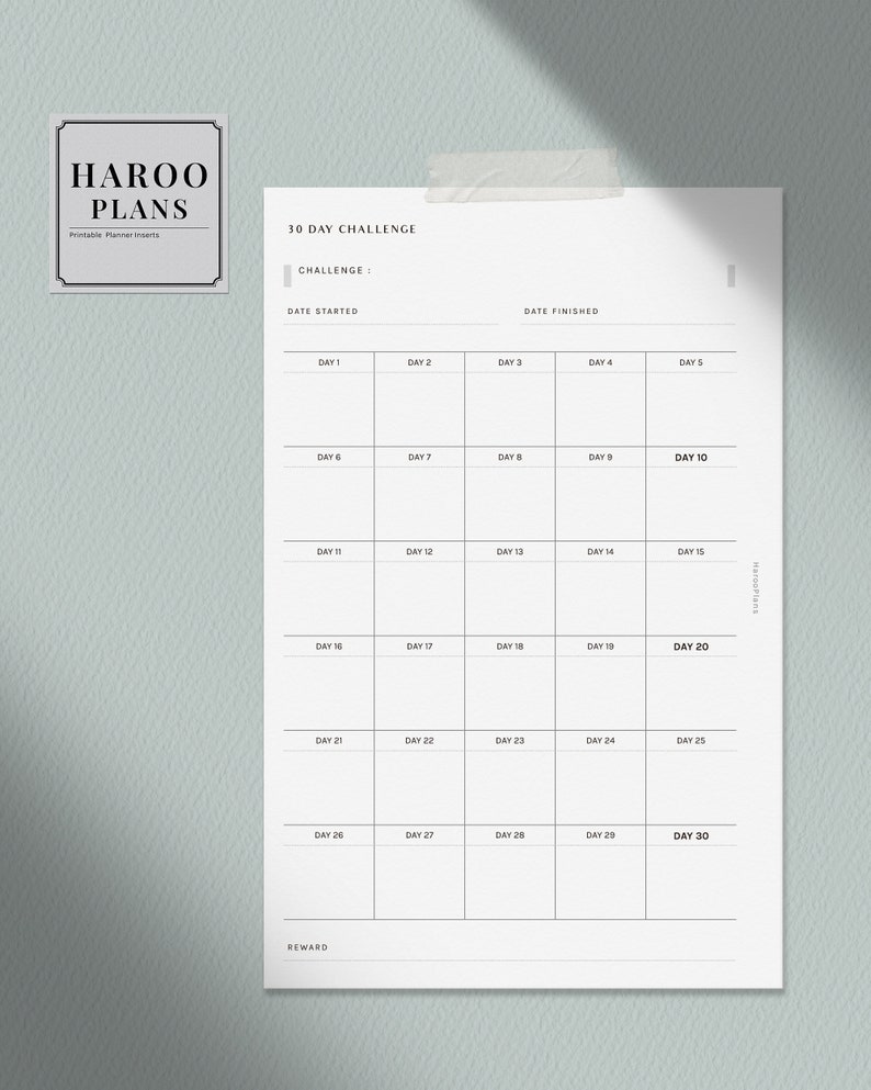 May include: A printable 30-day challenge tracker with a blank space for the challenge name. The tracker is divided into 30 days, with a space for each day to write in tasks or goals. There is also a space at the bottom for a reward.