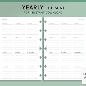May include: A black and white printable yearly planner for a Happy Planner mini size planner. The planner is divided into 12 months with each month having its own column. The planner is designed to be printed and used in a Happy Planner mini.