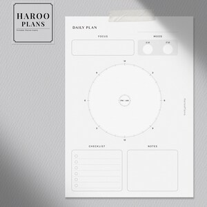 May include: A printable daily planner page with sections for focus, mood, checklist, and notes. The page also includes a circular time tracker with numbers 1 through 12 and the words "PM/AM" in the center.