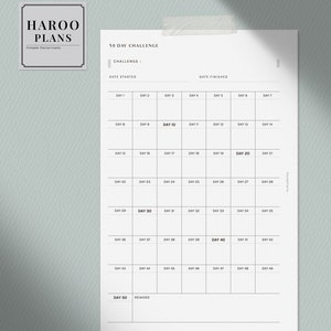 May include: A printable 50-day challenge tracker with a grid of 50 squares, each labeled with a day number. The tracker is designed for use with a planner or journal. The text "50 Day Challenge" is at the top of the page, and the text "Challenge:" is below it. The text "Date Started" and "Date Finished" are at the top of the page.