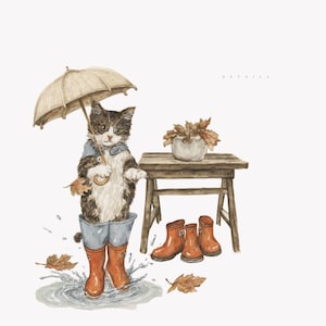 May include: Watercolor illustration of a cat wearing a blue shirt, blue jeans, and orange rain boots, holding a beige umbrella. The cat is standing in a puddle with splashing water. A small wooden table holds a white pot with autumn leaves. Three pairs of orange rain boots are on the ground.