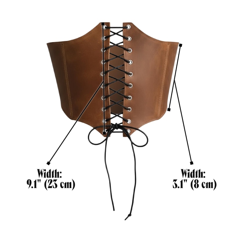 May include: Brown leather corset with black lacing. The corset has a width of 9.1 inches (23 cm) at its widest point and 3.1 inches (8 cm) at its narrowest point. The corset is designed to cinch the waist.