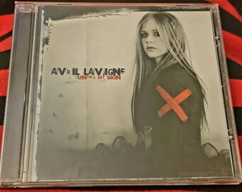 Avril Lavigne "Under My Skin" music CD. [Used and in good condition]