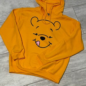 Winnie the pooh hoodies for adults 2025
