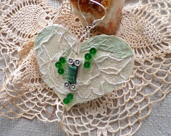 Mosiac green stone and heart ornament.  Green cylinder stone embellished with gorgeous beads and vintage lace. Truly a one-of-a-kind gift.