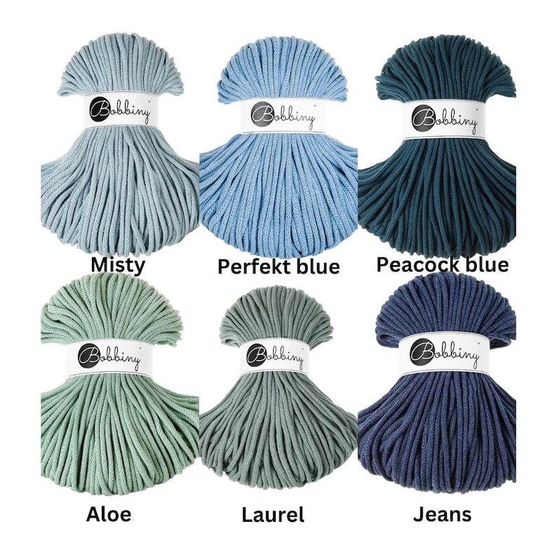 May include: Six skeins of Bobbiny cord arranged in two rows. The top row features Misty, Perfekt blue, and Peacock blue. The bottom row displays Aloe, Laurel, and Jeans. Each skein is secured with a white paper band labeled with the brand name.