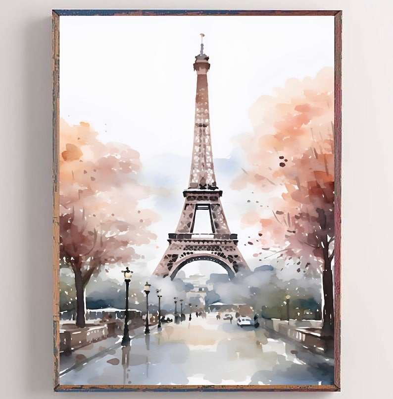 May include: A watercolor painting of the Eiffel Tower in Paris, France. The tower is depicted in the center of the image, with trees and streetlights on either side. The sky is a light blue, and the trees are a soft brown and pink.