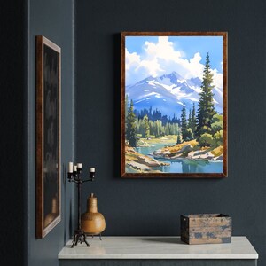 May include: A framed painting of a mountain landscape with a river flowing through it. The painting is in a brown frame and is hanging on a dark blue wall.
