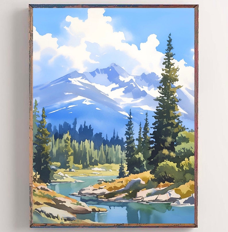May include: A framed watercolor painting of a mountain landscape with a blue sky, white clouds, and a river winding through a forest of pine trees. The mountains are snow-capped and the river is reflecting the blue sky.