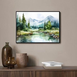 May include: Watercolor painting of a forest scene with a river flowing through it. The painting features a mountain range in the background, green trees, and a blue sky with white clouds.
