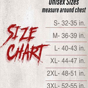 Op de afbeelding: Unisex maattabel met metingen in inches voor maten S tot en met 3XL. De tabel geeft aan "meet rond de borst".