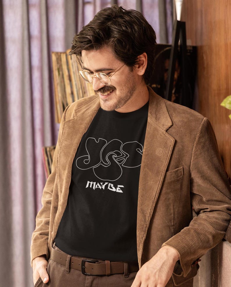 Mid-aged man with good taste in Prog music wearing a Yes-Maybe Tshirt.