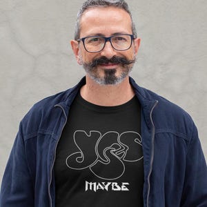 Classic guy wearing the classic prog band Yes design on a black tshirt.