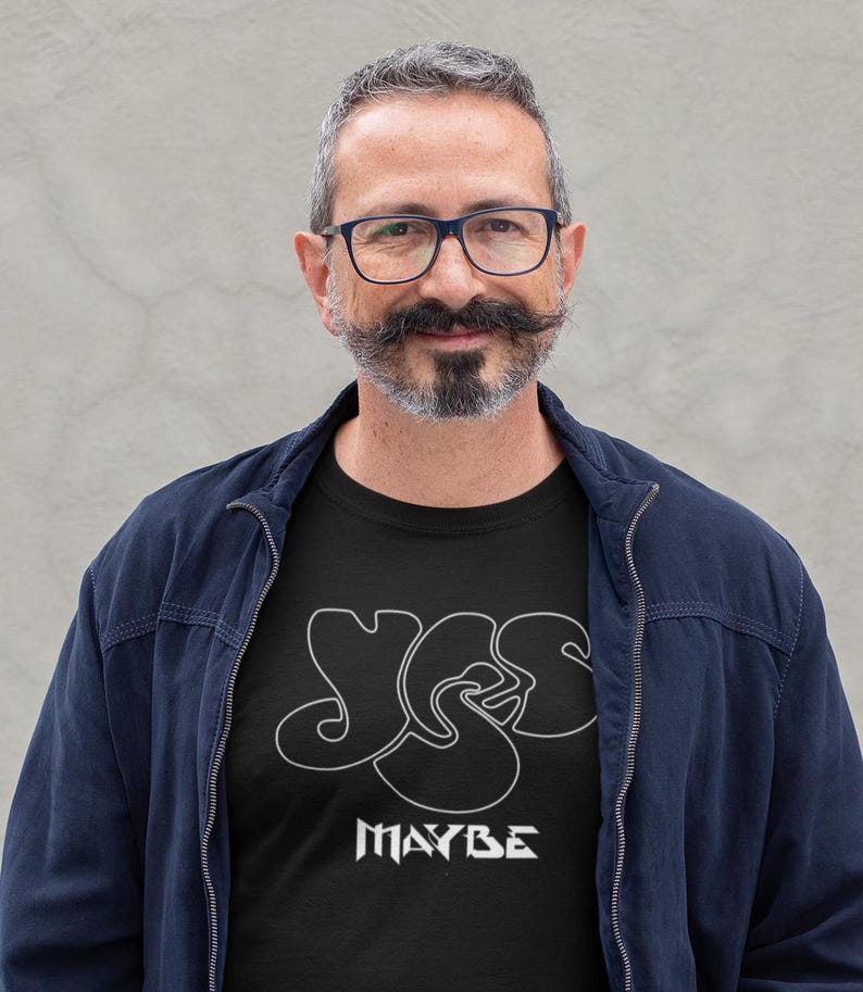 Classic guy wearing the classic prog band Yes design on a black tshirt.