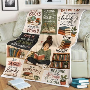 May include: A cozy reading blanket featuring a collage of book-themed illustrations and quotes. The design includes stacks of books, a girl reading, and phrases like "Reading takes you on the greatest adventures." The blanket is perfect for book lovers.