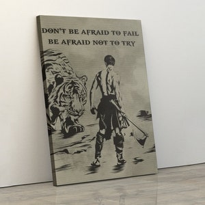 May include: A motivational quote, "Don't be afraid to fail, be afraid not to try", is displayed on a canvas print. A black and white illustration of a man holding an axe and a tiger walking towards him is in the background.