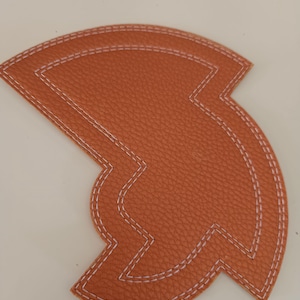 El Camaleón, una plantilla de costura de imitación de cuero para trazar círculos y arcos. (No se realizan envíos a EE. UU. por el momento).