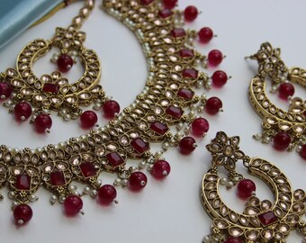 Rei Ruby - Set di collana con orecchini e Tikka