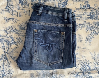 Vaqueros Diesel vintage en azul medio, unisex, talla W31, rectos, tiro medio, estilo urbano.
