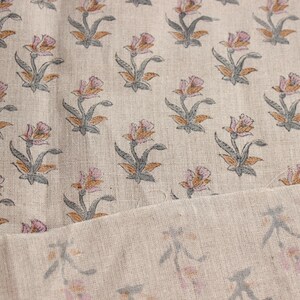 Indian pure  linen fabric, floral art print for table runners and pillow covers
Boho-style floral print on pure  linen for Indian handmade napkins and drapes, Floral Indian design on heavy linen for chair upholstery and living room decor.