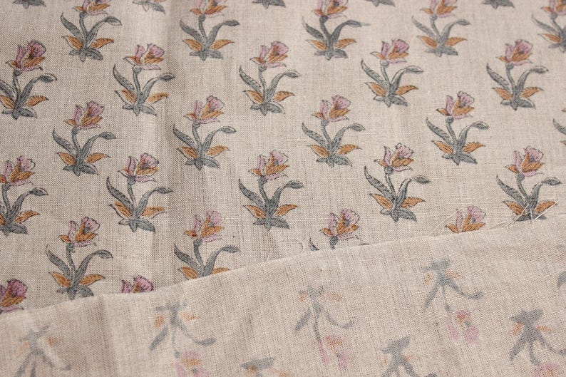 Indian pure  linen fabric, floral art print for table runners and pillow covers
Boho-style floral print on pure  linen for Indian handmade napkins and drapes, Floral Indian design on heavy linen for chair upholstery and living room decor.