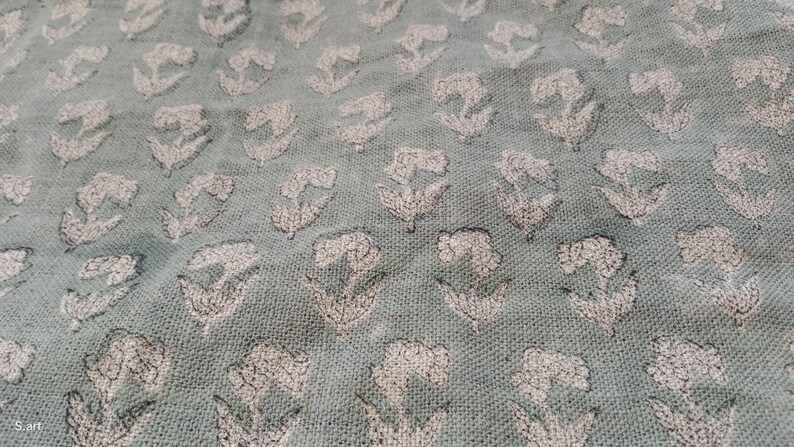 Thick linen fabric with Indian floral pattern for rustic chairs and tablecloths, Indian floral art on thick linen for elegant farmhouse napkins and drapery, Handcrafted thick linen fabric with floral prints for napkin and pillow styling.