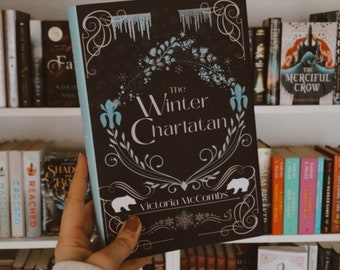 The Winter Charlatan paperback signed copy