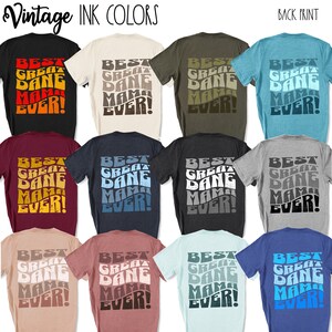 May include: A collage of 10 t-shirts with different coloured backgrounds. Each t-shirt has the same text on the back: "BEST GREAT DANE MAMA EVER!" The text is in a retro, wavy font.
