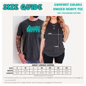 May include: Size guide for a unisex heavy tee, featuring a model wearing a dark gray t-shirt with the text "Monster Muttz" in teal. The guide includes measurements in inches for sizes S to 4X, with width ranging from 18.25 to 29.75 inches and length from 26.6 to 33.5 inches.