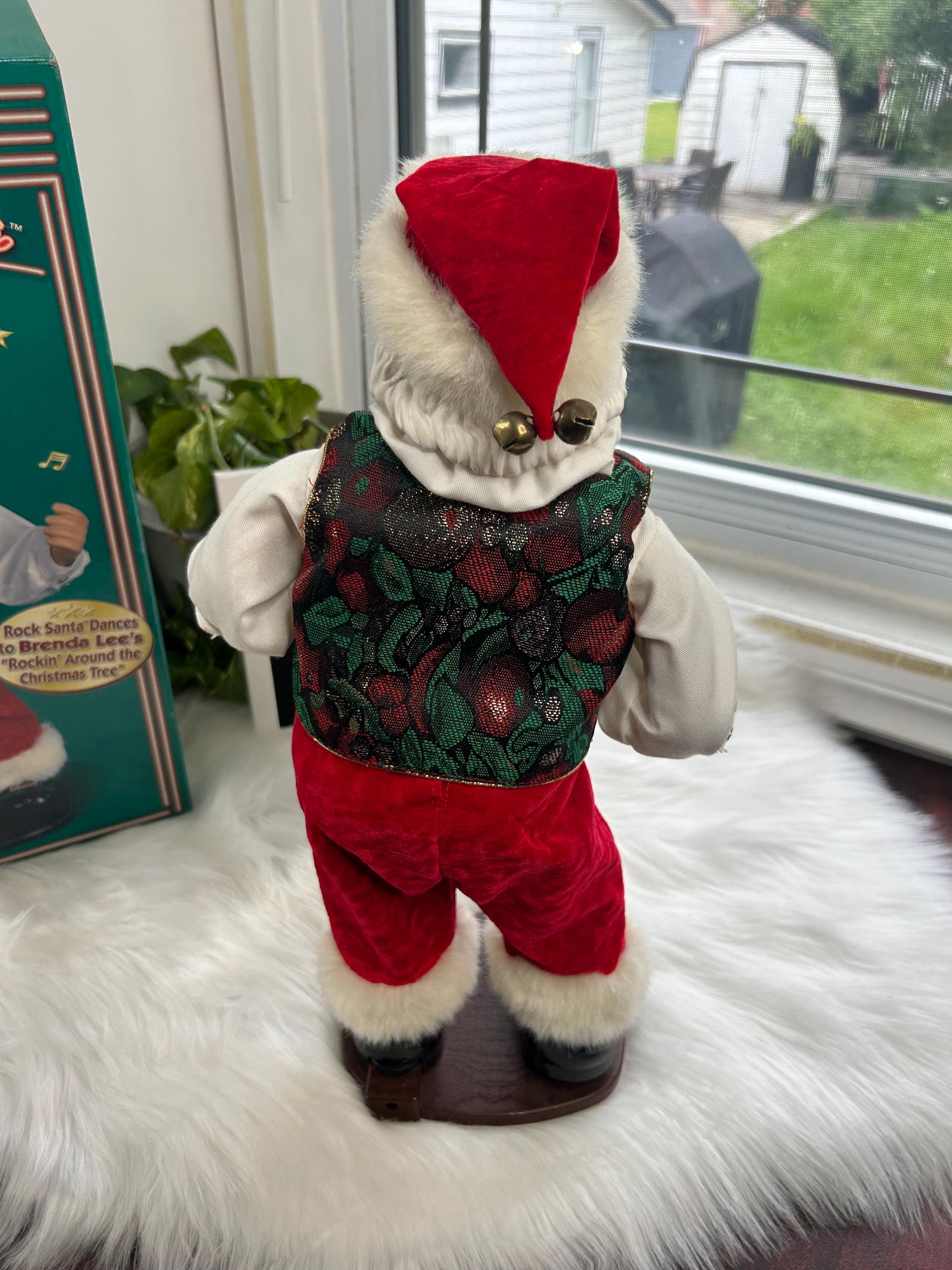 90年代のヴィンテージのサンタのフィギュアがクリスマスツリーの飾りの