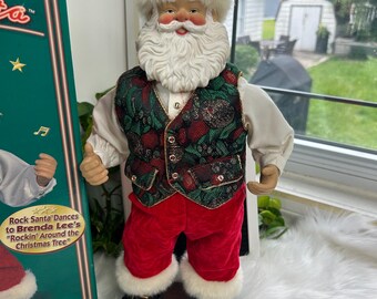 90年代のヴィンテージのサンタのフィギュアがクリスマスツリーの飾りの