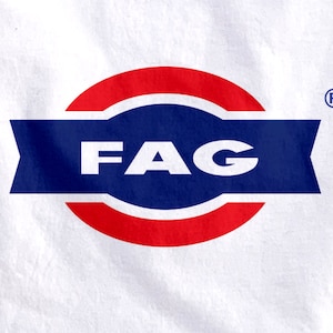 May include: A white background with a red circle and a blue banner with the word "FAG" in white letters. The circle has a white outline and the banner has a white outline. There is a registered trademark symbol in the upper right corner.