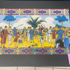 May include: A colorful vintage illustration of people on a beach in Malibu, California. The illustration features a palm tree, a car, and a dog. The text "MALIBU" is printed at the top of the illustration.