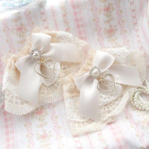 Set of 2 Wrist Cuffs Gloves Lace Sleeves ,Beige and white Lace Black Bow Pearl heart pendant,  maiden lolita style Victorian