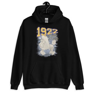 May include: Black hoodie with a white poodle graphic and the text "1922 Pretty Poodle" in yellow and purple.