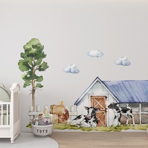 May include: A watercolor illustration of a white farmhouse with a blue roof, a green tree, and two black and white cows. The farmhouse has a brown door and a white picket fence. There are also some clouds in the sky. The words "TOYS" are printed on a gray basket.