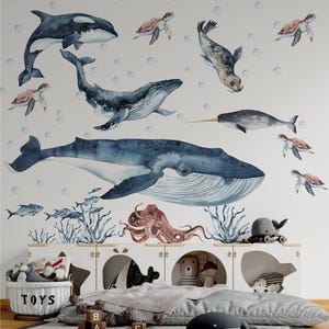 Nursery ocean wall decals and whale stickers featuring watercolor blue whale, octopus, and narwhal