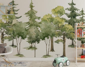 May include: A wall mural featuring a watercolor forest scene with various green pine and deciduous trees. The design includes a light gray background, a white wooden shelf on the left, a white wooden shelf on the right, and a light blue ride-on toy.