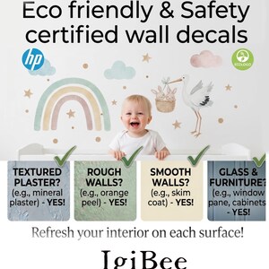 A smiling baby is shown in front of a wall decal featuring a stork, rainbow, and clouds. The wall decal is described as eco-friendly and safety certified, with options for textured plaster, rough walls, smooth walls, and glass and furniture. The image also includes a message encouraging the viewer to refresh their interior on each surface with the product from Igi Bee.