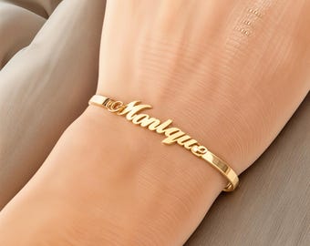 Può includere: Braccialetto con nome in oro con il nome "Manique" inciso.