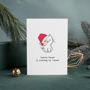 Les pattes du Père Noël arrivent en ville - Carte de Noël drôle de chaton | Carte de voeux de fête des Fêtes de <br> Profitez-en ! Jeu de mots amusant pour les amoureux des chats