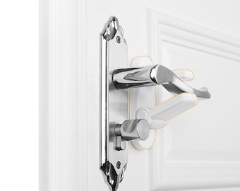 May include: A white door handle safety lock with a chrome door handle. The lock is designed to prevent children from opening doors.