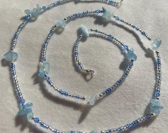 Aquamarin Splitter mit silbernen und blauen Akzenten