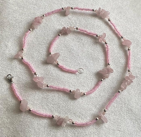 Chipped Rose Quartz stone with pink accent and silver accent waist beads