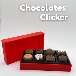 May include: A red box with a lid next to a red tray filled with eight assorted chocolates. The chocolates are various shapes and have different toppings. The text "Chocolates Clicker" is above the box.