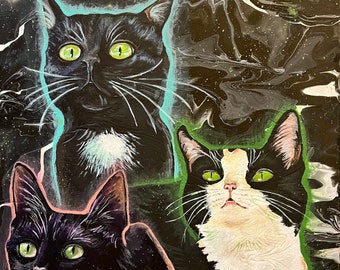May include: A painting of three cats with green eyes. The cats are painted in a black and white color scheme against a black background with white and green swirls.